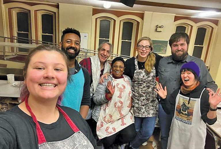 A volunteer crew at Stone Soup Kitchen in January 2023 (Photo credit: https://www.iowasource.com/2023/02/27/stone-soup/)